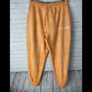 PRETTYLITTLETHING ORANGE TIE DYE JOGGERS 10
